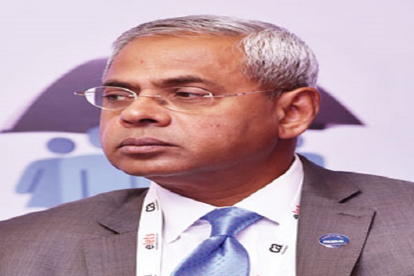 Abraham Chacko,  Executive Director, Federal Bank